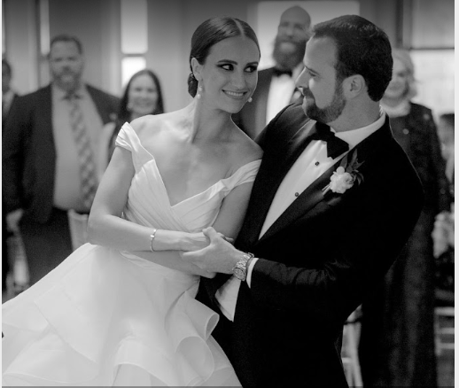 A black and white photo of a couple dancing